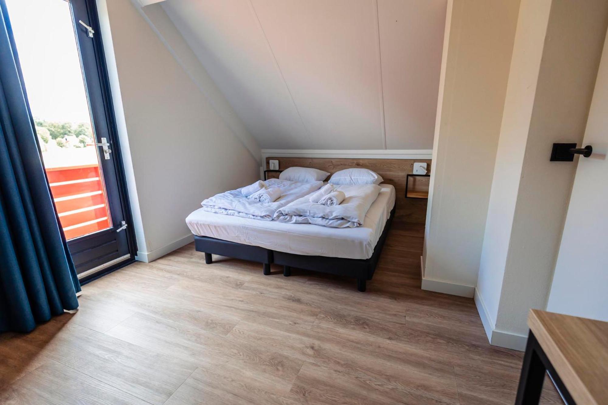 Hotel Vakantiepark 'T Broeckhuys à Ewijk Chambre photo